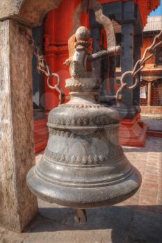 Freely walk monkey. Votive temples and shrines in a row at Pashupatinath Temple, Kathmandu, Nepal.