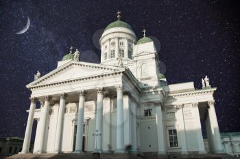 Senate Square - the area in the center of Helsinki in Kruununhaka district, visiting card of the city. night shining moon and stars.