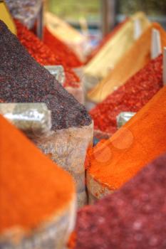 Spices lies on the counter in the market