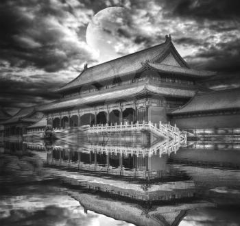 Forbidden City is the largest palace complex in the world. Located in the heart of Beijing. In the evening by the light of the moon. black and white photography
