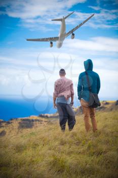 two men on the edge of the Rano Kau volcano, Easter island, Chile, South America