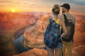 A married couple travels across the USA. Famous Horseshoe Bend of the Colorado River in northern Arizona