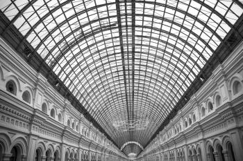 black and white photo of the ceiling and walls of GUM Moscow