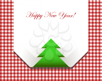 Red checkered picnic tablecloth with christmas tree