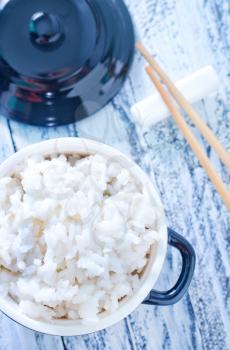 boiled rice in bowl and on a table