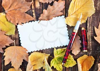 autumn leaves on a table, autumn background
