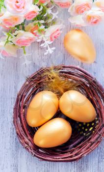 decorative painted Easter eggs on a table, easter background