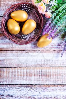 color easter eggs on a table, easter background