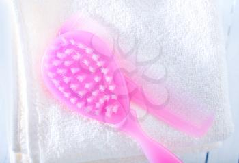 hairs brushes and baby clothes