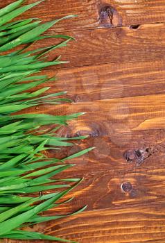 green grass and wooden boards