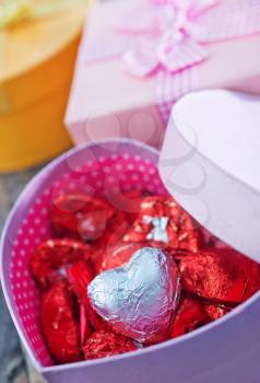 chocolate candy and box for present on a table