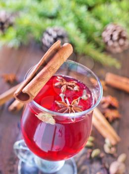 mulled wine and christmas decoration on a table