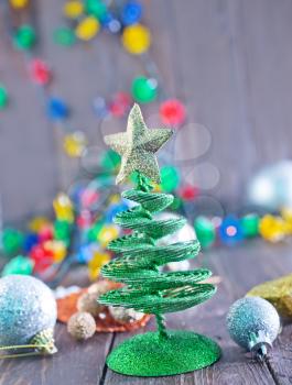 christmas tree and christmas decoration on atable