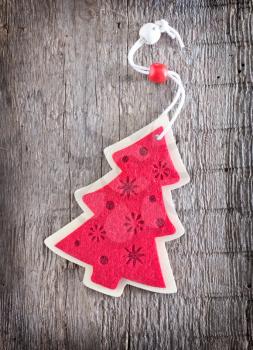 red christmas decoration on the wooden table