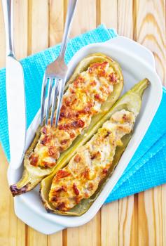 stuffed marrow with meat and cheese in the bowl