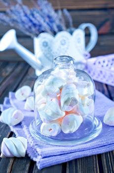 cmarshmallows in bowl and on a table