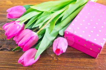 flowers on the wooden table, spring background