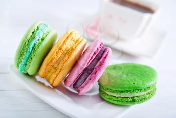 macaroons on plate and on a table