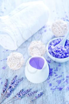 spa objects, lavender soap and towel on a table