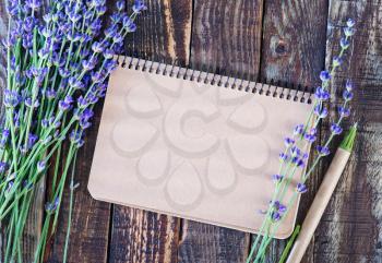 lavender on a table, flowers on the wooden background