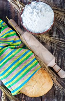 bread in napkin and on a table