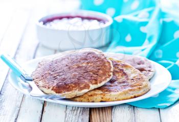 sweet pancakes with jam on the plate