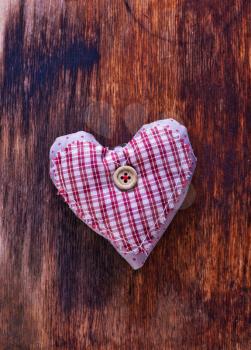 Love hearts on vintage wood, violet hearts