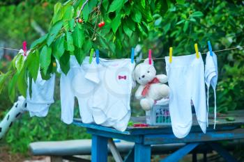 baby clothes, clear baby linnen in garden