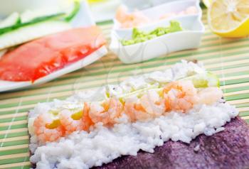 Fresh ingredients for sushi, rice and shrimps