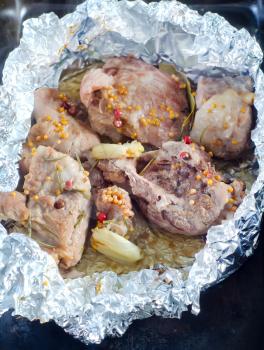 baked meat in the foil