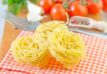 raw pasta and tomato