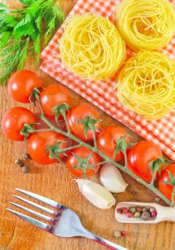 raw pasta and tomato