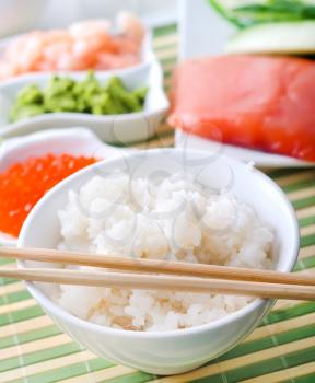 Boiled rice with ingredients for sushi