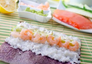 Fresh ingredients for sushi, rice and shrimps