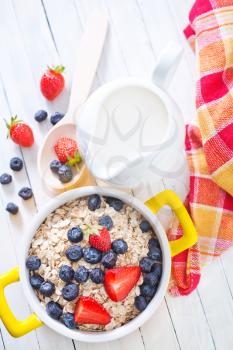 oat flakes with fruits in the bowl