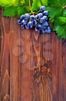 fresh grape on the wooden table, grape on a table