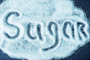 text on white sugar, sugar on the table