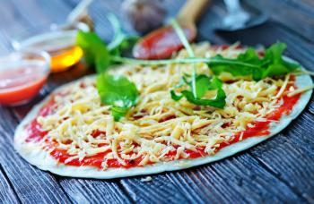 pizza with tomato sauce and fresh cheese