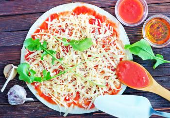 pizza with tomato sauce and fresh cheese