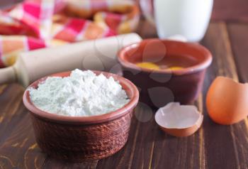 ingredients for dough on the wooden table