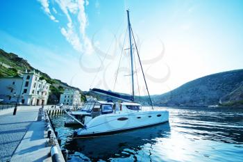 Boats and yachts in old port in Crimea