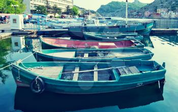 Boats and yachts in old port in Crimea