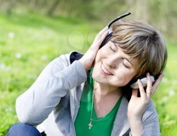 young wooman with headphones