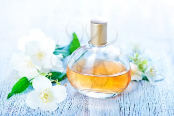 perfume in bottle and on a table