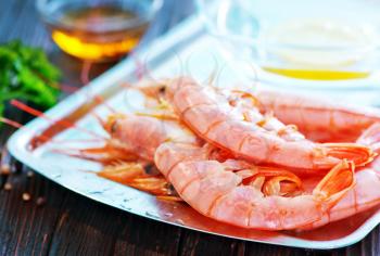 portion of big shrimps with salt and spice