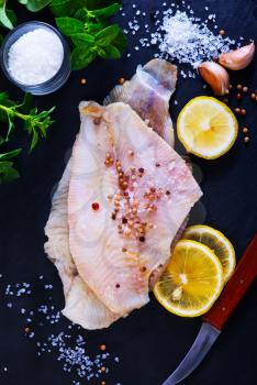 raw fish with aroma spice and fresh lemon