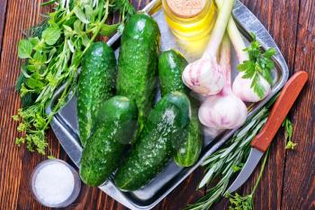 fresh cucumber an garlic on a table