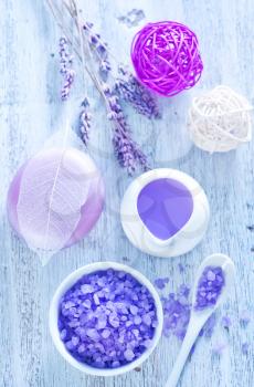 spa objects, lavender soap and towel on a table