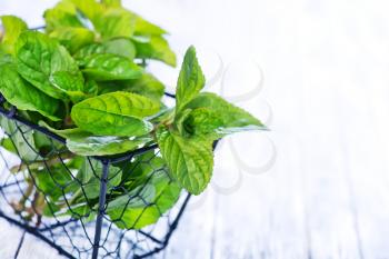 fresh mint and knife on the white table