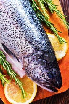 raw fish with spice and salt on a table